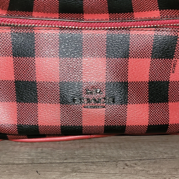 coach backpack red and black This League Flap Backpack is a gently worn design restored to its original condition by the talented craftspeople at our Coach Repair Workshop Coach Sprint Backpack In Signature